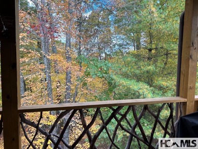 Step into this exceptional multifamily duplex home, nestled in on Trillium Links in North Carolina - for sale on GolfHomes.com, golf home, golf lot