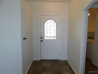 Discover this stunning 3-bedroom, 2-bath home located on a on Desert Lakes Golf Course in Arizona - for sale on GolfHomes.com, golf home, golf lot