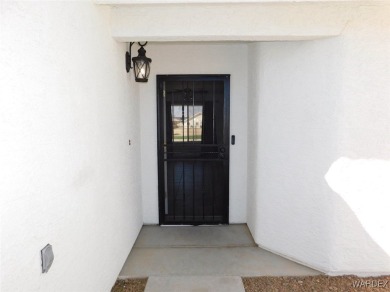 Discover this stunning 3-bedroom, 2-bath home located on a on Desert Lakes Golf Course in Arizona - for sale on GolfHomes.com, golf home, golf lot