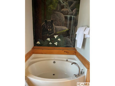 Step into this exceptional multifamily duplex home, nestled in on Trillium Links in North Carolina - for sale on GolfHomes.com, golf home, golf lot