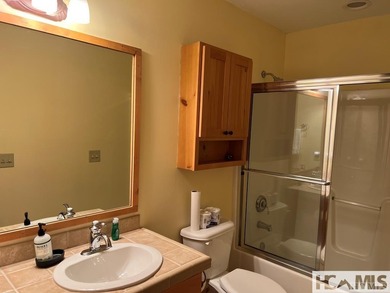 Step into this exceptional multifamily duplex home, nestled in on Trillium Links in North Carolina - for sale on GolfHomes.com, golf home, golf lot