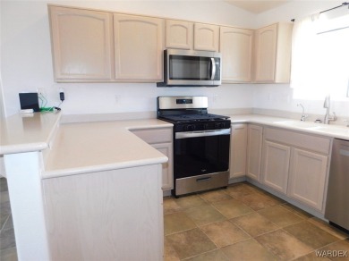 Discover this stunning 3-bedroom, 2-bath home located on a on Desert Lakes Golf Course in Arizona - for sale on GolfHomes.com, golf home, golf lot