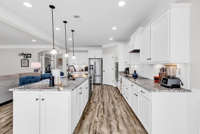 Welcome to effortless living in this beautifully maintained on Myrtlewood Golf Course and Club  in South Carolina - for sale on GolfHomes.com, golf home, golf lot