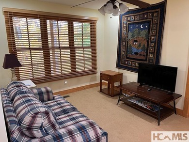 Step into this exceptional multifamily duplex home, nestled in on Trillium Links in North Carolina - for sale on GolfHomes.com, golf home, golf lot