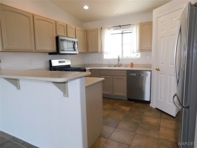 Discover this stunning 3-bedroom, 2-bath home located on a on Desert Lakes Golf Course in Arizona - for sale on GolfHomes.com, golf home, golf lot