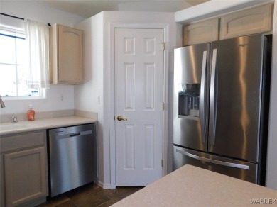 Discover this stunning 3-bedroom, 2-bath home located on a on Desert Lakes Golf Course in Arizona - for sale on GolfHomes.com, golf home, golf lot
