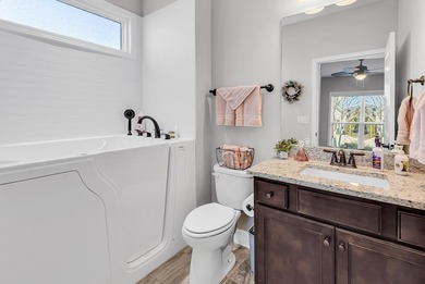 Welcome to effortless living in this beautifully maintained on Myrtlewood Golf Course and Club  in South Carolina - for sale on GolfHomes.com, golf home, golf lot