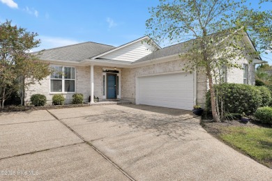 Beautiful all-brick home boasts an open layout that immediately on Magnolia Greens Golf Plantation in North Carolina - for sale on GolfHomes.com, golf home, golf lot