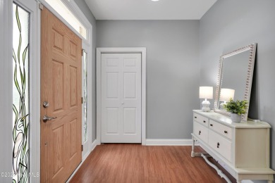 Beautiful all-brick home boasts an open layout that immediately on Magnolia Greens Golf Plantation in North Carolina - for sale on GolfHomes.com, golf home, golf lot