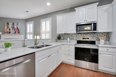 Beautiful all-brick home boasts an open layout that immediately on Magnolia Greens Golf Plantation in North Carolina - for sale on GolfHomes.com, golf home, golf lot