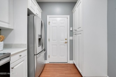 Beautiful all-brick home boasts an open layout that immediately on Magnolia Greens Golf Plantation in North Carolina - for sale on GolfHomes.com, golf home, golf lot