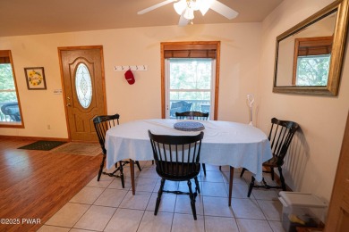 Charming ranch home in The Hideout offering a bright, open floor on The Hideout Golf in Pennsylvania - for sale on GolfHomes.com, golf home, golf lot