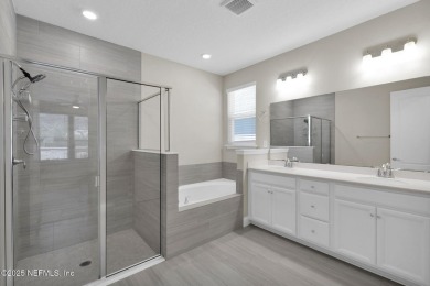 This Palencia pool home offers serene preserve views & plenty of on The Palencia Club in Florida - for sale on GolfHomes.com, golf home, golf lot