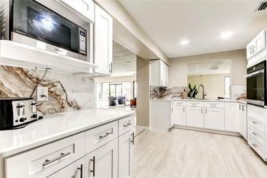 Under contract-accepting backup offers. One or more photo(s) has on Feather Sound Country Club in Florida - for sale on GolfHomes.com, golf home, golf lot