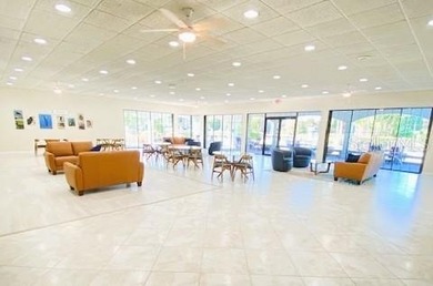 Under contract-accepting backup offers. One or more photo(s) has on Feather Sound Country Club in Florida - for sale on GolfHomes.com, golf home, golf lot