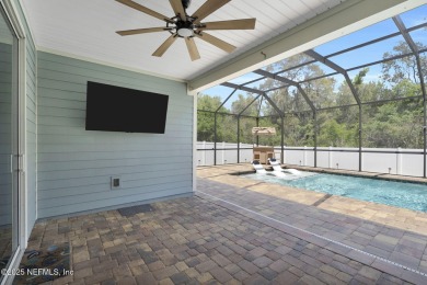 This Palencia pool home offers serene preserve views & plenty of on The Palencia Club in Florida - for sale on GolfHomes.com, golf home, golf lot