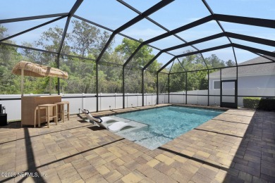 This Palencia pool home offers serene preserve views & plenty of on The Palencia Club in Florida - for sale on GolfHomes.com, golf home, golf lot