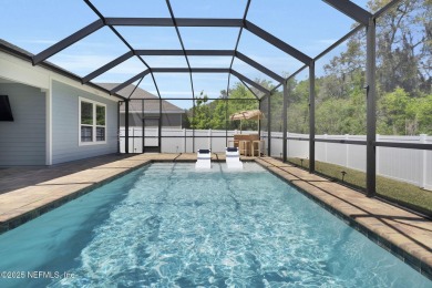 This Palencia pool home offers serene preserve views & plenty of on The Palencia Club in Florida - for sale on GolfHomes.com, golf home, golf lot