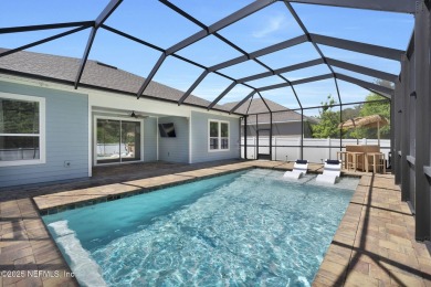 This Palencia pool home offers serene preserve views & plenty of on The Palencia Club in Florida - for sale on GolfHomes.com, golf home, golf lot