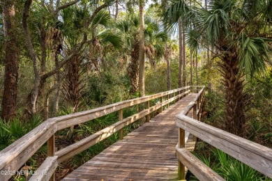 This Palencia pool home offers serene preserve views & plenty of on The Palencia Club in Florida - for sale on GolfHomes.com, golf home, golf lot