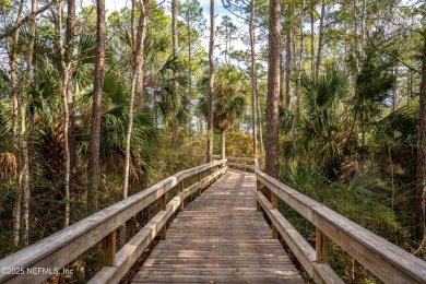 This Palencia pool home offers serene preserve views & plenty of on The Palencia Club in Florida - for sale on GolfHomes.com, golf home, golf lot