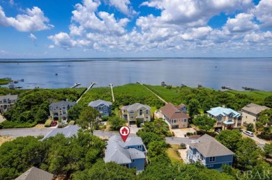 An extensive and pricey exterior transformation on this on The Currituck Golf Club in North Carolina - for sale on GolfHomes.com, golf home, golf lot