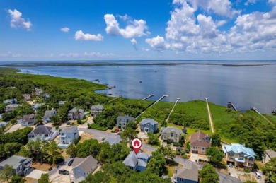 An extensive and pricey exterior transformation on this on The Currituck Golf Club in North Carolina - for sale on GolfHomes.com, golf home, golf lot