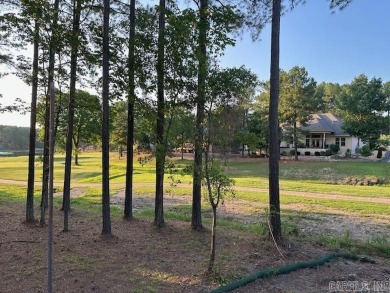 This fabulous new construction home invites you in with both the on Granada Golf Course in Arkansas - for sale on GolfHomes.com, golf home, golf lot