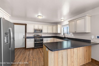 This well-cared for, remodeled home in Star Valley Ranch is on Star Valley RV Golf Course in Wyoming - for sale on GolfHomes.com, golf home, golf lot