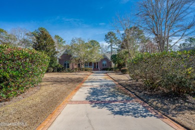 Gorgeous brick home sitting on .75/acre in the one and only on Ocean Ridge Plantation in North Carolina - for sale on GolfHomes.com, golf home, golf lot