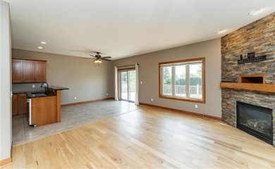 Impeccably maintained and packed with upgrades, this stunning on Willow Creek Golf Course  in Minnesota - for sale on GolfHomes.com, golf home, golf lot