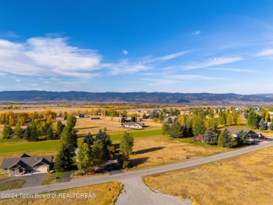 Two contiguous lots on the 10th fairway offer both beautiful on Cedar Creek Golf Course in Wyoming - for sale on GolfHomes.com, golf home, golf lot