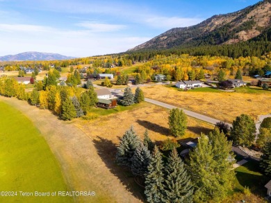 Two contiguous lots on the 10th fairway offer both beautiful on Cedar Creek Golf Course in Wyoming - for sale on GolfHomes.com, golf home, golf lot