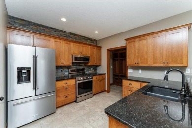 Impeccably maintained and packed with upgrades, this stunning on Willow Creek Golf Course  in Minnesota - for sale on GolfHomes.com, golf home, golf lot