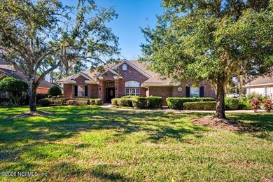 This delightful 5-bedroom, 3-bathroom custom brick home is a on Country Club of Orange Park in Florida - for sale on GolfHomes.com, golf home, golf lot
