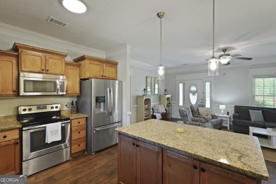 Live on vacation when you make 1653 Hawthorne Rd in the Shellman on Sapelo Hammock Golf Club in Georgia - for sale on GolfHomes.com, golf home, golf lot