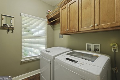 Live on vacation when you make 1653 Hawthorne Rd in the Shellman on Sapelo Hammock Golf Club in Georgia - for sale on GolfHomes.com, golf home, golf lot