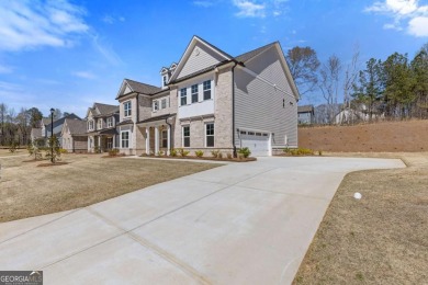 Nestled in the sought-after Traditions of Braselton community on Traditions of Braselton Golf Club in Georgia - for sale on GolfHomes.com, golf home, golf lot