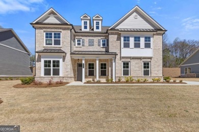 Nestled in the sought-after Traditions of Braselton community on Traditions of Braselton Golf Club in Georgia - for sale on GolfHomes.com, golf home, golf lot
