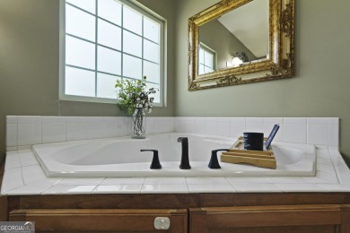 Live on vacation when you make 1653 Hawthorne Rd in the Shellman on Sapelo Hammock Golf Club in Georgia - for sale on GolfHomes.com, golf home, golf lot