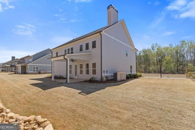 Nestled in the sought-after Traditions of Braselton community on Traditions of Braselton Golf Club in Georgia - for sale on GolfHomes.com, golf home, golf lot