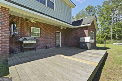 Live on vacation when you make 1653 Hawthorne Rd in the Shellman on Sapelo Hammock Golf Club in Georgia - for sale on GolfHomes.com, golf home, golf lot