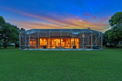 STUNNING, CUSTOM DESIGNED RESIDENCE, PERFECTLY SITUATED ON A 1/2 on The Legacy Golf and Tennis Club in Florida - for sale on GolfHomes.com, golf home, golf lot