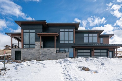 Experience refined mountain living in this move-in ready on Headwaters Golf Course At Granby Ranch in Colorado - for sale on GolfHomes.com, golf home, golf lot