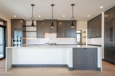 Experience refined mountain living in this move-in ready on Headwaters Golf Course At Granby Ranch in Colorado - for sale on GolfHomes.com, golf home, golf lot