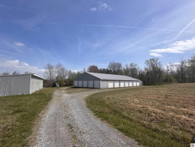 28 storage units on 3.75 acres .  There are 2 storage buildings for sale on GolfHomes.com