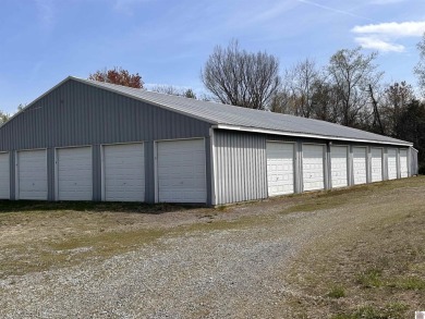 28 storage units on 3.75 acres .  There are 2 storage buildings on Arrowhead Golf Club in Kentucky - for sale on GolfHomes.com, golf home, golf lot