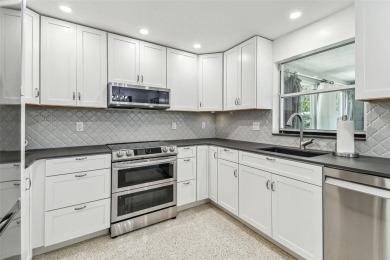 Pride of ownership shines throughout--this home is spotless on The Dunedin Country Club in Florida - for sale on GolfHomes.com, golf home, golf lot