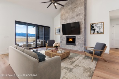 Overlooking open space to the Southern views of the Palisades on Headwaters Club At Teton Springs in Idaho - for sale on GolfHomes.com, golf home, golf lot