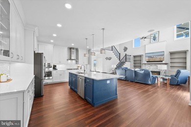 The welcoming covered entry of 33418 Islander Drive invites you on The Peninsula Golf and Country Club in Delaware - for sale on GolfHomes.com, golf home, golf lot